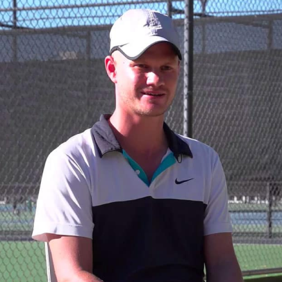 Florian Meier, OTI Founder and Head Coach, on a tennis court
